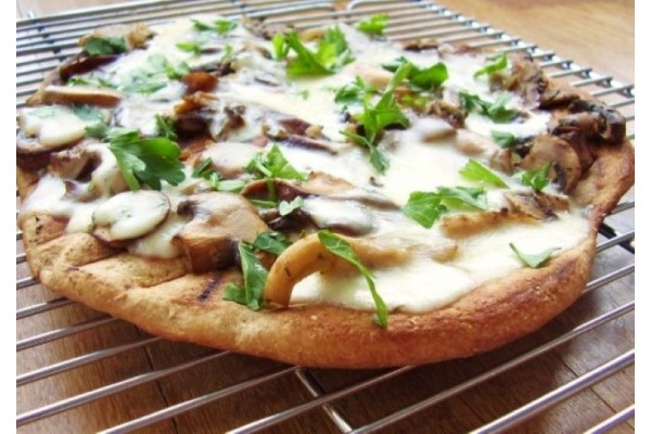 Pizza gourmet ai porcini e Taleggio